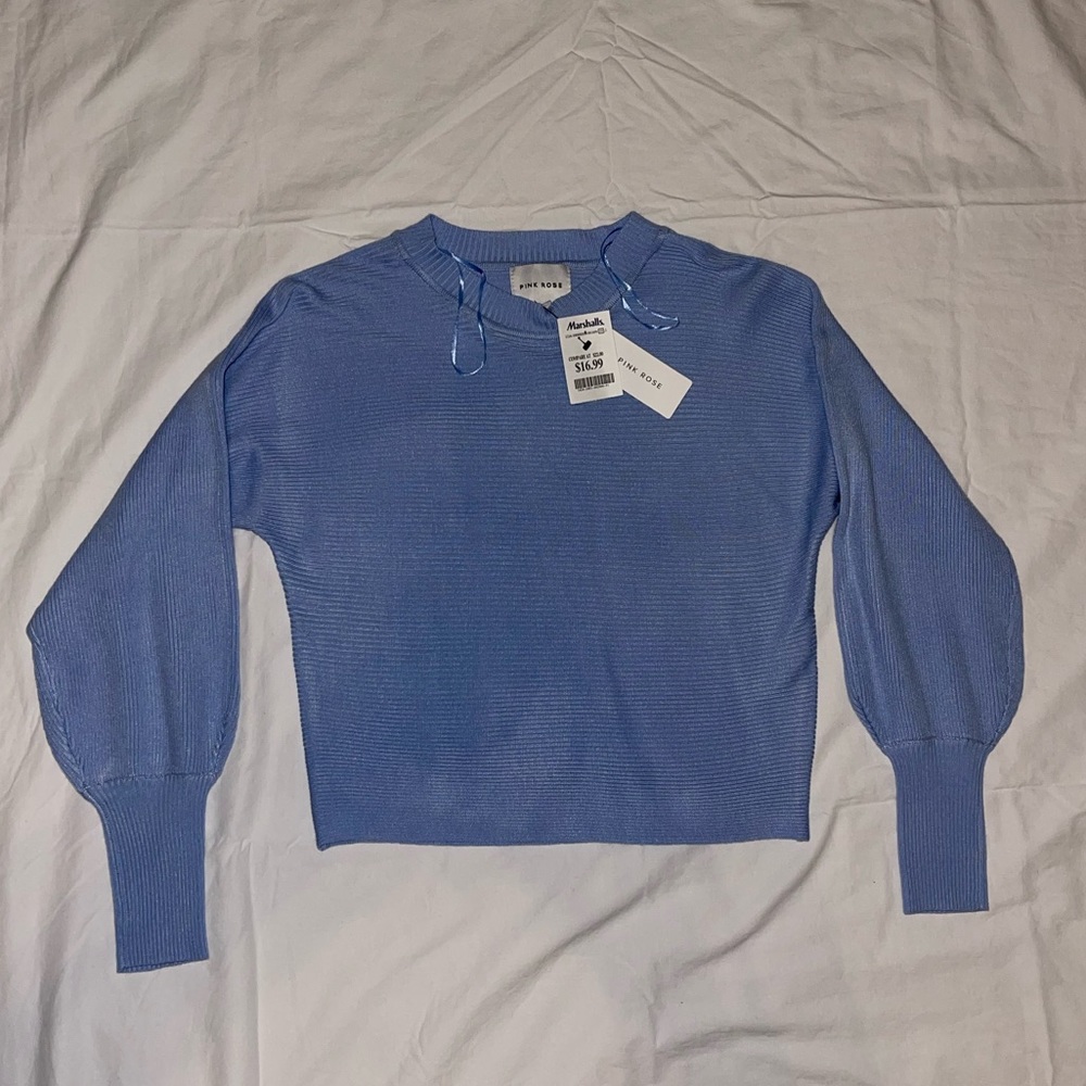 light blue sweater